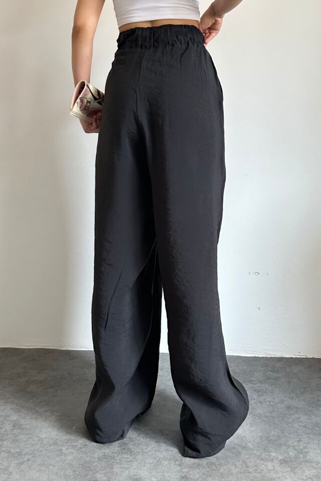 Feela Moda 2009 Beli Lastikli Paraşüt Kumaş Palazzo Kadın Pantolon 40 - Siyah