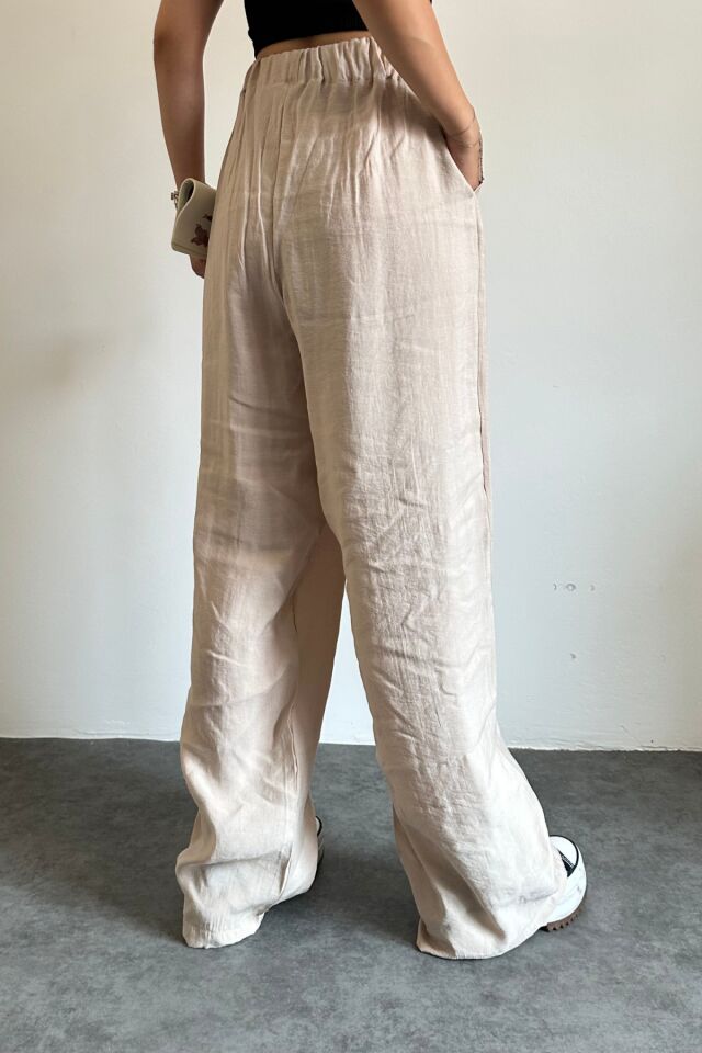 Feela Moda 2009 Beli Lastikli Paraşüt Kumaş Palazzo Kadın Pantolon 42 - Bej